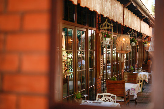 Terrace restaurant, setting tables outside