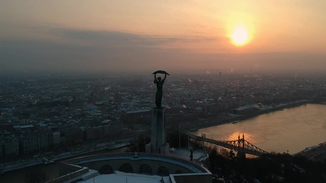 Liberty statue at sunrise, in Budapest, Hungary