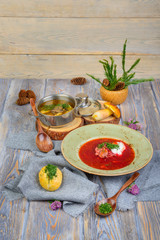soups in a composition on a wooden background