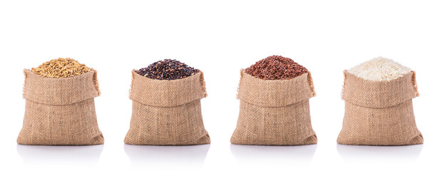 Set of Thai rice in brown small sack. Studio shot isolated on white background