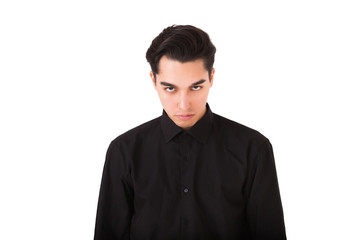 Dissatisfied and angry young man isolated on the white background