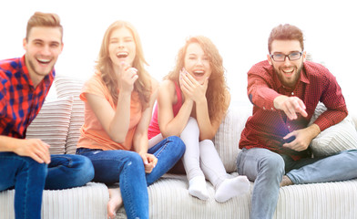 group of cheerful friends watching their favorite movie