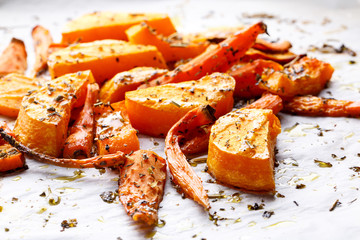 Oven baked vegetables with herbs and olive oil.