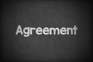 Agreement on Textured Blackboard.