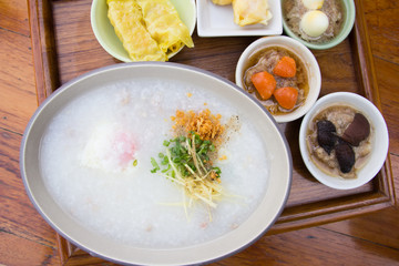 Porridge with dim sum on plate