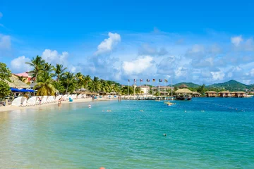 Photo sur Plexiglas Plage tropicale Pigeon Island Beach - tropical coast on the Caribbean island of St. Lucia. It is a paradise destination with a white sand beach and turquoiuse sea.