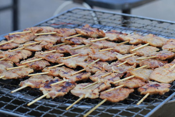 Close up grilled porks on fire stove