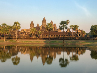Angkor wat ,Khmer architecture and the world heritage at Siem Reap Cambodia with water reflect at sunset