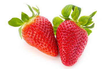 Fresh strawberries close up on white background.