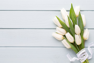 Mother's Day, woman's day, easter, white tulips, presents on gray  background.