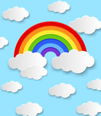 Colorful rainbow and clouds in blue sky