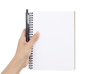 Hand holding pen and notebook on white background.