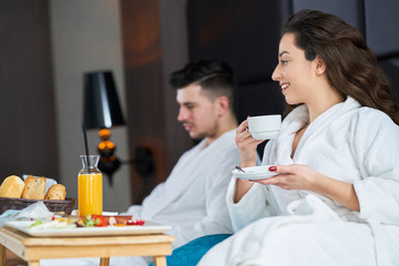 Breakfast in bed, cozy hotel room