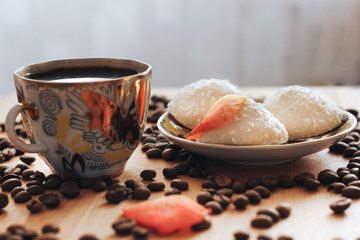delicious white cookies on a saucer with coffee for Breakfast