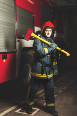 Firefighter with a tool