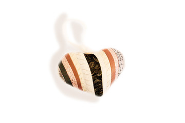 Valentine striped textile  heart. Isolate on white. Hand made.