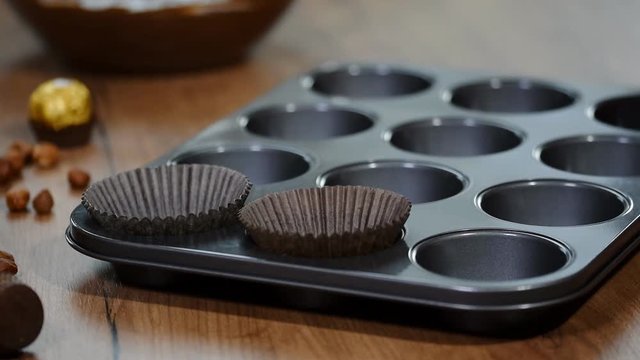 Baking Cupcake, putting cupcake wrappers in baking tray