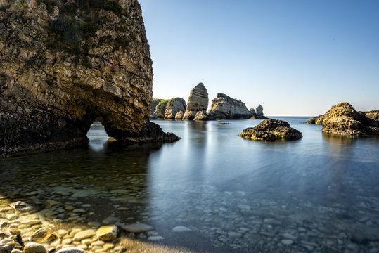 Fototapeta long exposure shot on sea with rocks