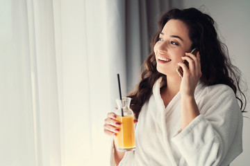Fototapeta premium Girl talking on the phone