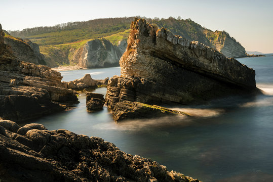 Fototapeta long exposure shot on sea with rocks