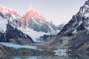 First sun rays against mountain peak in Patagonia, Argentina