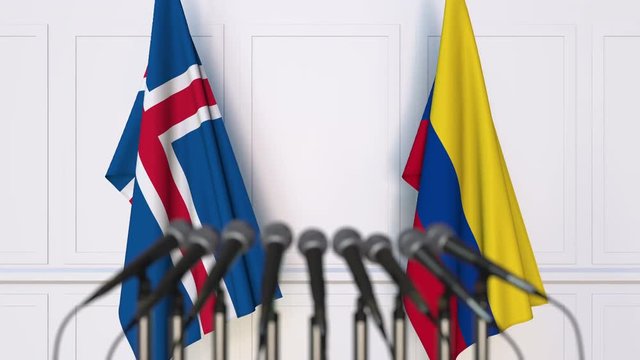 Flags of Iceland and Colombia at international meeting or negotiations press conference