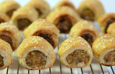 Sausage Roll Appetiser lined up on cooling rack