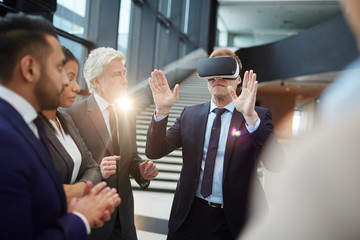 One of modern politicians in vr headset commenting what he sees on virtual display at conference