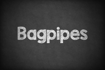 Bagpipes on Textured Blackboard.