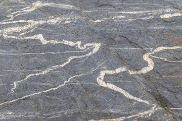 Quartz veins exposed n the granite rocks  near 