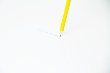 A pencil draws a line on a White paper looking for ideas, an authors picture 