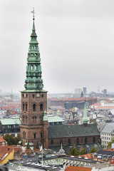 Fototapeta na wymiar Nikolaj Church in Copenhagen On A Gray Day