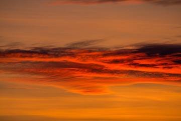 sunset in the winter frosty evening in the Russian outback