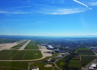 Stuttgart, Germany - June 11, 2017: Aerial view of Stuttgart area and an airport landing strip