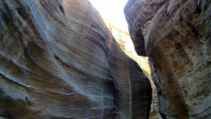 Long curved yellow stone bent narrow mountain  canyon