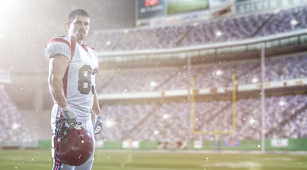 American Football Player isolated on big modern stadium field