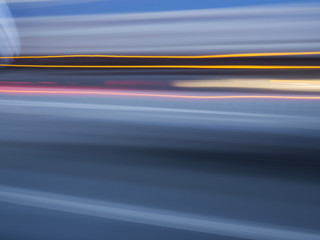 Cars lights in movement at highway.