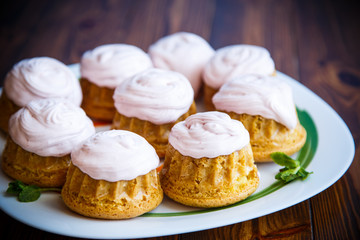 Obraz na płótnie Canvas sweet muffins with berry cream