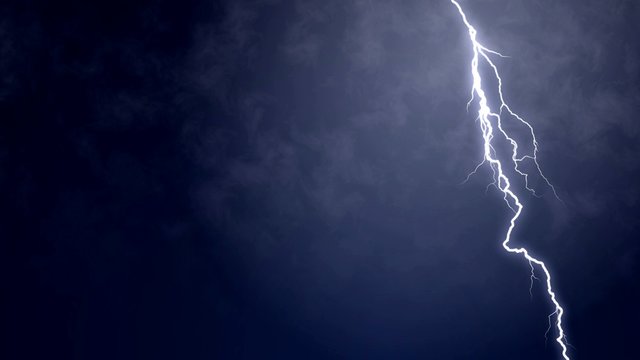 Detailed view of electric firebolt flashing down towards the ground, nature