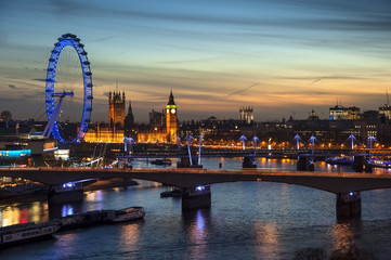 Obraz na płótnie Canvas Beautiful landscape image of the London skyline at night looking along the River Thames