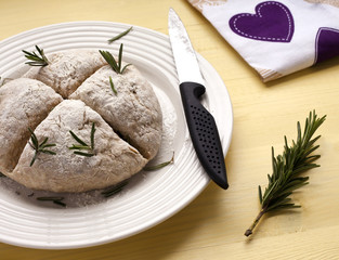 Baker making traditional Irish Soda Bread for St Patrick's Day Festivities