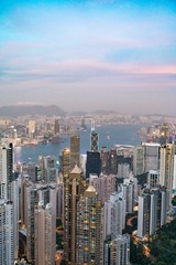 Naklejka premium Hong Kong tower on sundown bird eye view from kowloon at victoria peak tower the famous view point of hongkong