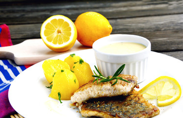 Grilled Fish with Lemon Butter Sauce and potatoes