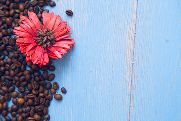 Coffee with sweets on a blue wooden background