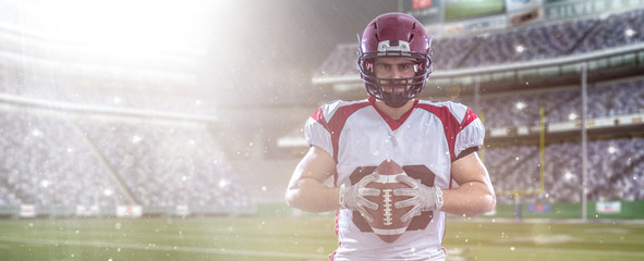American Football Player isolated on big modern stadium field