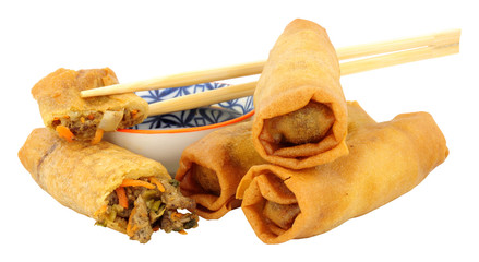 Chinese crispy duck filled spring rolls with soy sauce dip isolated on a white background