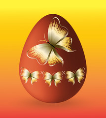 red easter egg with golden butterflies