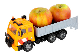 Toy truck loaded with fresh apples isolated on a white background