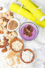 Healthy protein blueberry drink with oatmilk and nuts