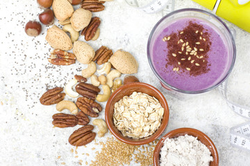 Healthy protein blueberry drink with oatmilk and nuts